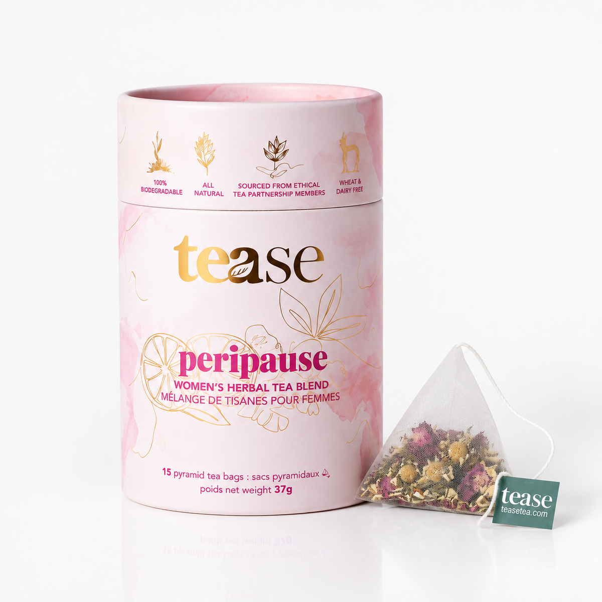 Pink cylindrical container of Tease Peri-Pause women's herbal tea blend with floral design and pyramid tea bag with loose.